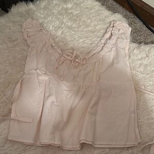 Pink ruffle sleeveless top
